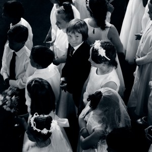 Boy looking up at first communion